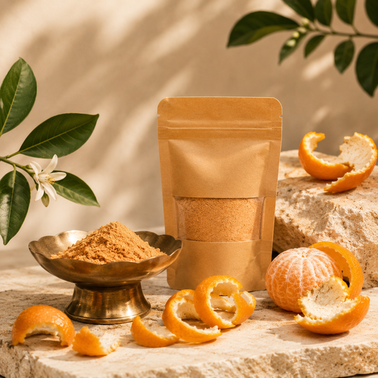 Pure Orange Peel Powder by Melange Care displayed with fresh oranges for DIY face packs and hair masks