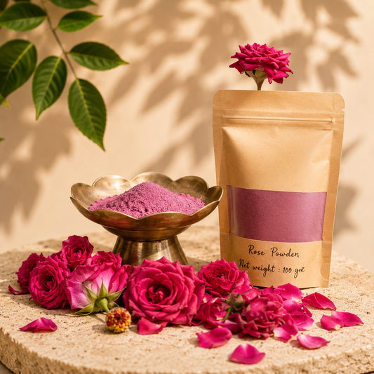 Pure Rose Powder by Melange Care surrounded by fresh roses for DIY face packs and hair masks